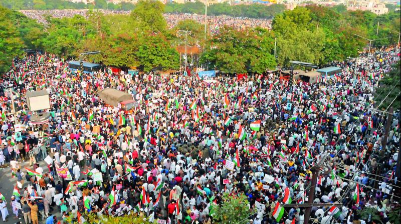 Big Massive rally in Hyderabad Telangana State Against Citizenship Amendment Act (CAA) CAB and NPR.  Over a 2.5 protesters wave the Tricolor during a demonstration against the amended Citizenship Act, NRC and NPR at Indira Park in Hyderabad on Saturday. Apart from the Dharna Chowk, the NTR Stadium, in the background, was also jam-packed with protesters